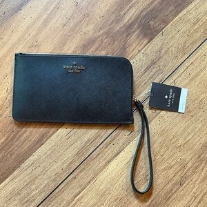 kate spade black leather wristlet with gold logo